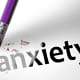 picture of the word Anxiety being erased