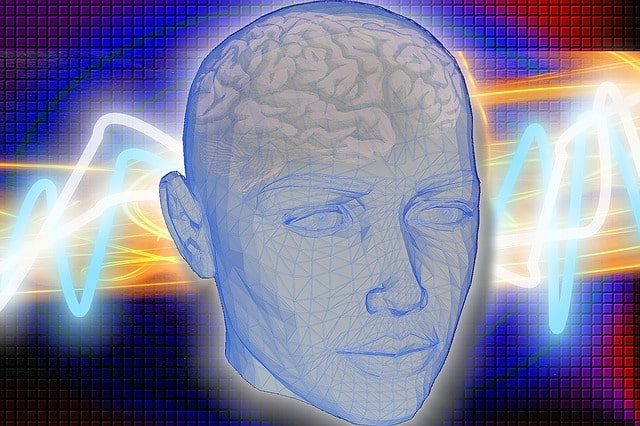 Digital illustration of a human head with brainwave patterns for mental health therapy.